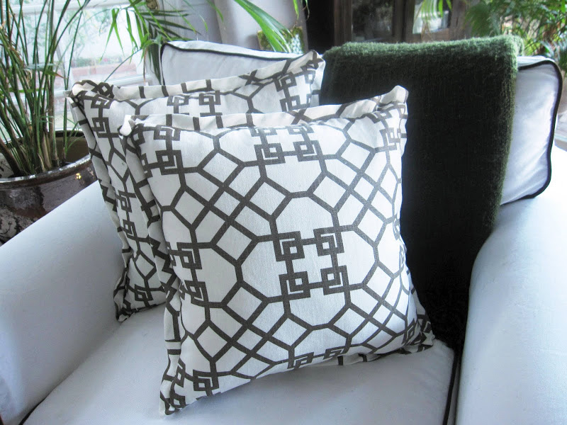 Two custom throw pillows made of Windsor Smith Home 100% linen fabric in the Pelagos print