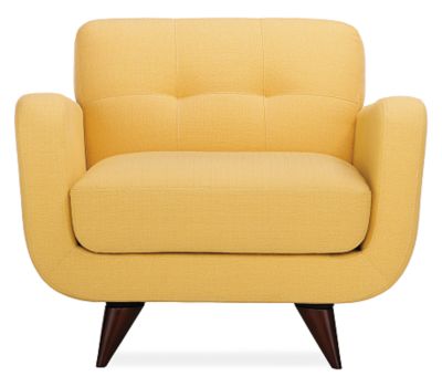 Upholstered maize yellow armchair from Room & Board