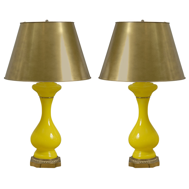 Bright yellow glass lamp with gold base from Pieces Inc.