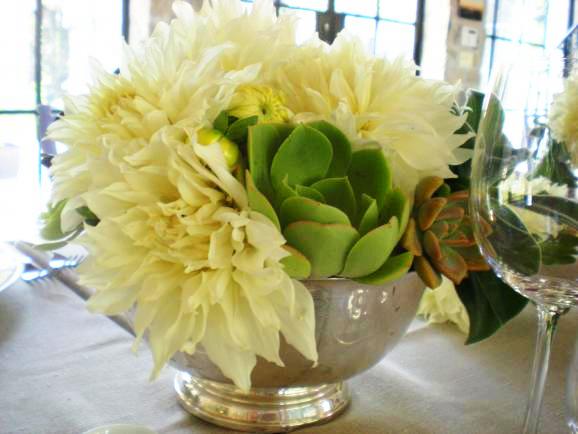 Green succulents and white dinner plate Dahlias in a vintage silver revere bowl by Lily Lodge