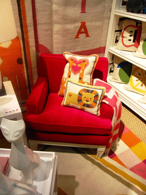  A mini hot pink velvet upholstered Templeton armchair from the Jonathan Adler Junior collection at the New York International Gift Fair