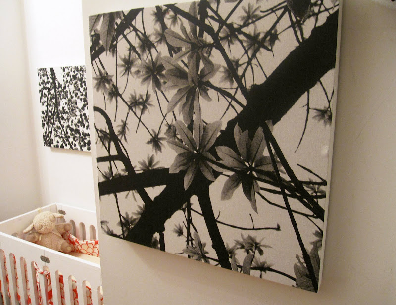 Black and white Asian inspired floral fabric stretched on square canvas frames in a nursery in a NYC loft
