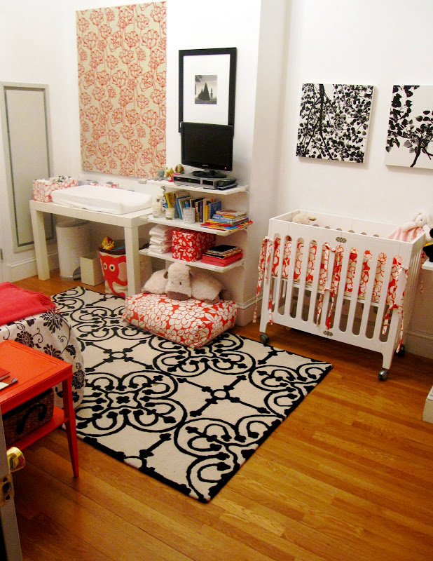 Colorful nursery in an NYC loft with stylish prints and florals