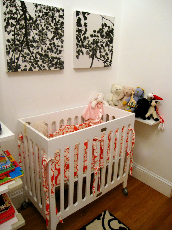 All white crib from bloom's Alma crib from tottini in a nursery in an NYC loft