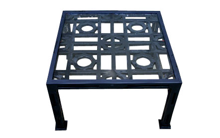 Iron outdoor coffee table with a modern graphic top