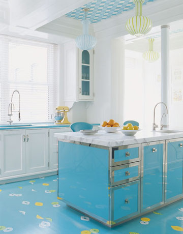 Turquoise kitchen with matching island, floor and painted ceiling
