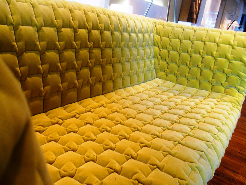 Close up of a green modern sofa from Ligne Roset