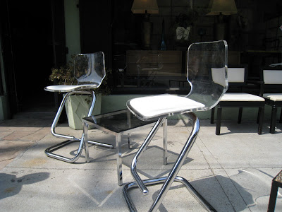  Lucite and chrome barstools from Design Modern
