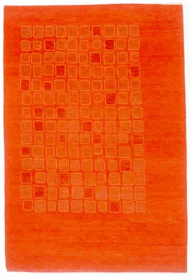 Orange wool rug from Elso & Company