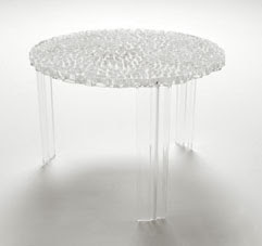 Round polycarbonate table by Kartell from Weego Home