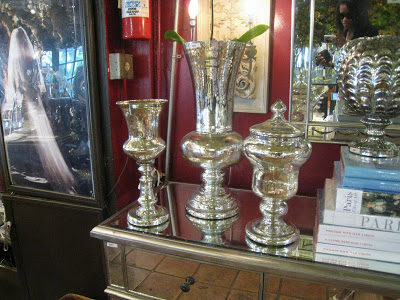 Mercury glass urns and vases at a shop on Rue Jacob in Paris