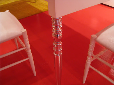 Close up of a silver leg on a restaurant table from Cappellini
