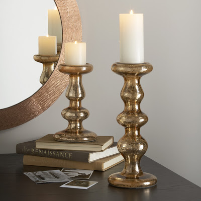 Two Mercury glass candlesticks with a copper finish from West Elm