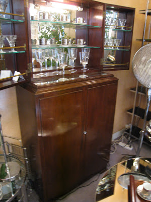 Mahogany art deco bar cabinet with mirrored cabinet interior 