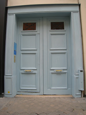 A classic panel Tiffany blue door on Rue St. Honore