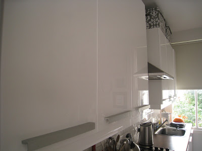 White Ikea cabinets and counters handles in a London kitchen