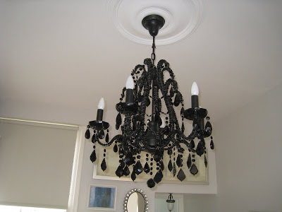 Black chandelier in a small London kitchen