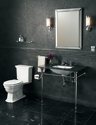 Black bathroom with black marble mosaic tile on the wall from Ann Sack and black marble tile floor