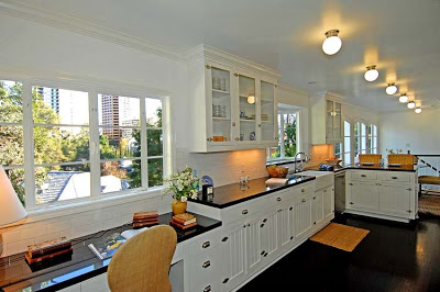 Kitchen after remodeling by Newman & Wolen Design with a built in desk area