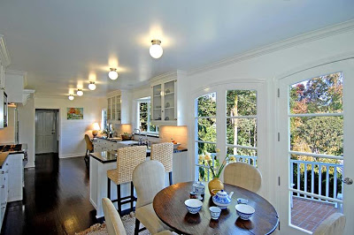 Breakfast nook after remodeling by Newman & Wolen Design with new French doors 