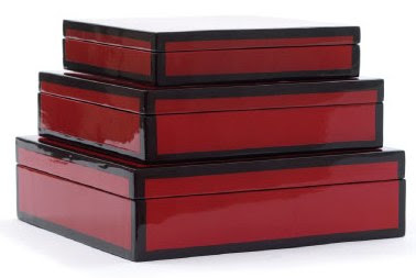 Three red lacquer boxes with black trim from Mitchell Gold + Bob Williams