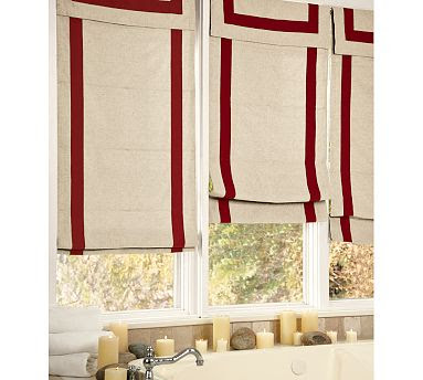 Roman shade with red trim from Pottery Barn