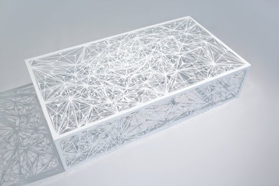 Laser cut white steel coffee table from Pure Modern