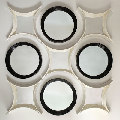 Round mirrors in a tiered ring from Z Gallerie