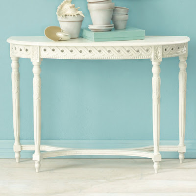 White wood table with antique detail including grooved spindle legs from Wisteria