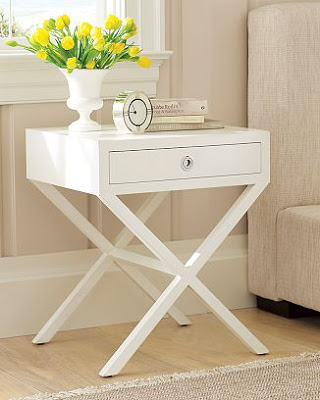 White wood side table with an X-base and one drawer from William Sonoma Home