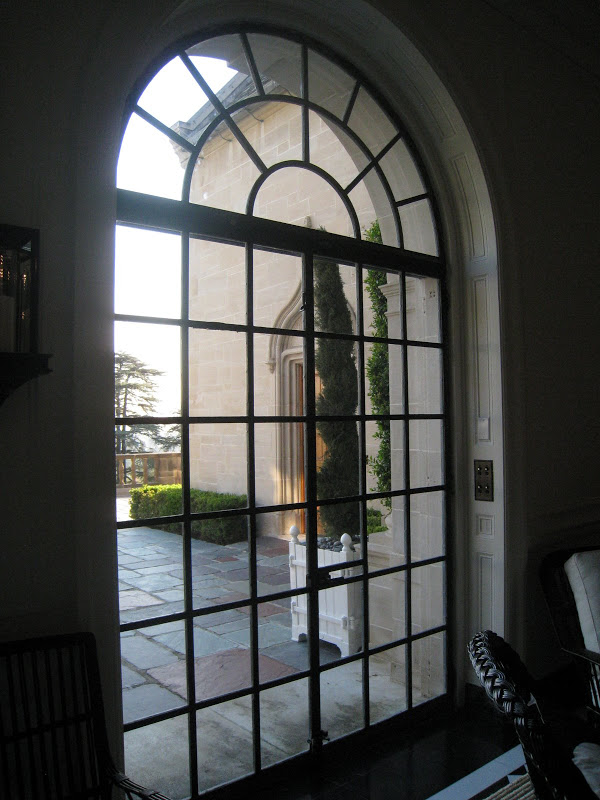 Large multi-paned leaded glass windows and doors in the Greystone mansion