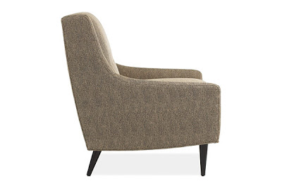 Dark grey upholstered armchair with three button back from Room & Board