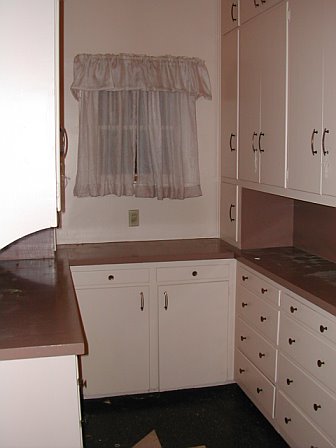 Pink butler's cabinet prior to remodeling by Newman & Wolen Design