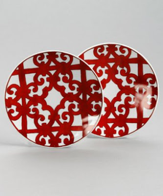 Two red and white Hermes porcelain dessert plates from Bluefly
