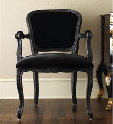 Black wood armchair with black velvet upholstery from Neiman Marcus