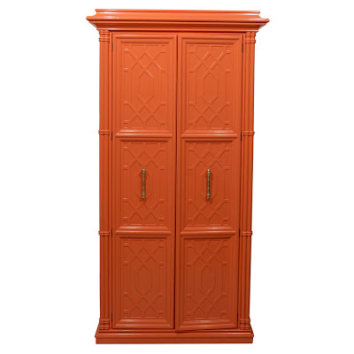 Vintage newly painted fretwork orange cabinet from Pieces Inc