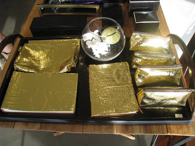 Gold journals, make up bags, small pencil make up bags and photo albums from Persimmon