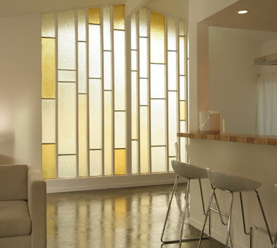 Entry hall by The Sunset Team/La Kaza Design with stain glass windows