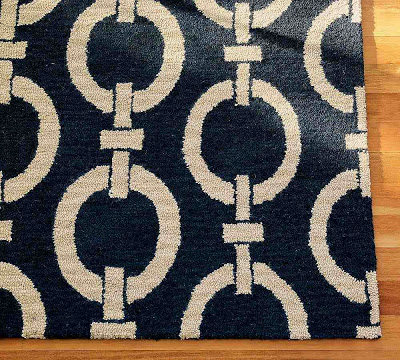 Blue and cream wool rug with a chain pattern from Pottery Barn