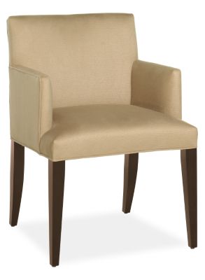 Cognac colored upholstered tight back and seat arm chair from Room & Board