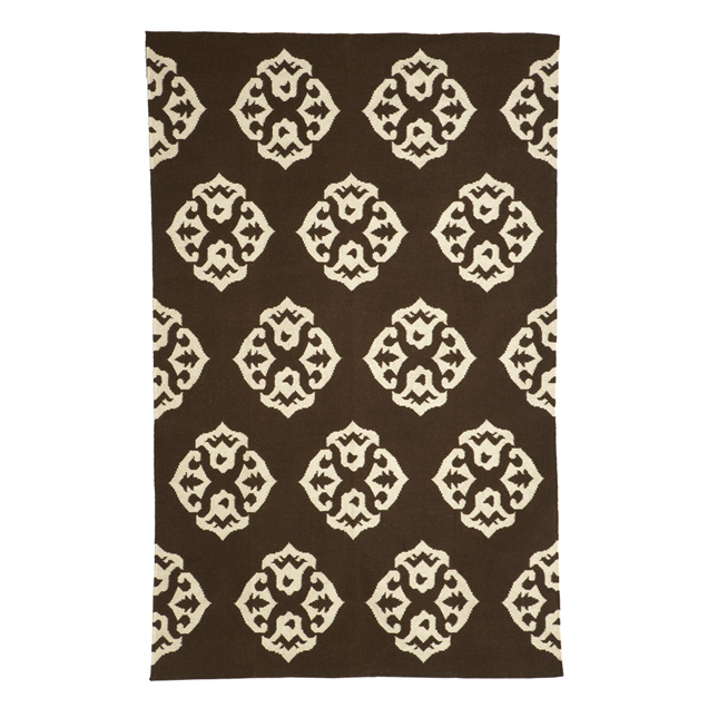 Brow and white replica of a Madeline Weinrib rug from West Elm