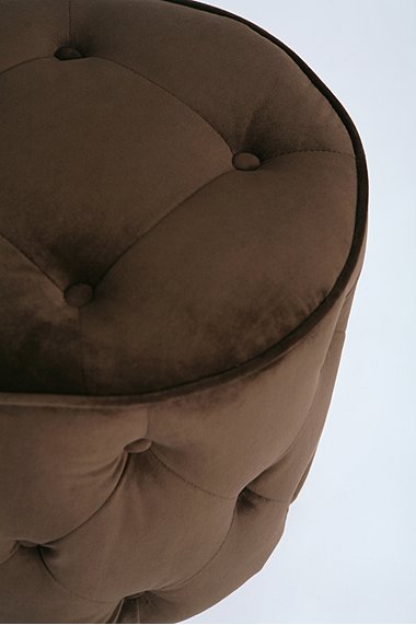 Brown tufted velvet round ottoman from Urban Outfitters
