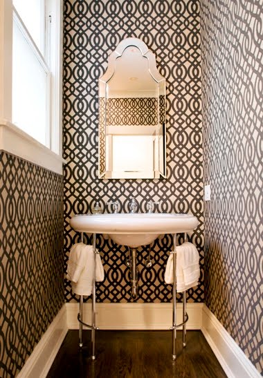 Powder room with graphic print wallpaper from DuBarry