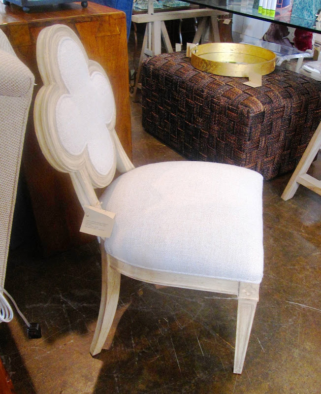 Small side chair with quatrefoil back, cream linen upholstery and an antique white finish from Mecox Gardens