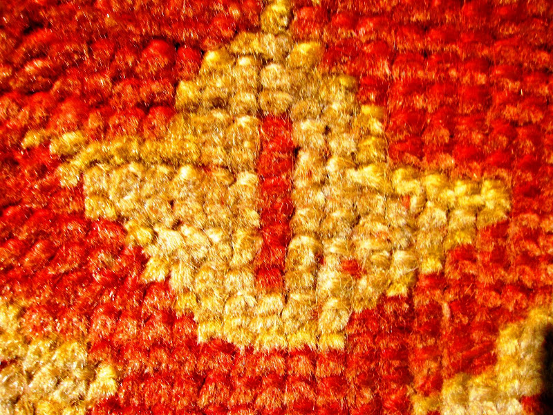 Close up of a red and tan Oushak carpet from West Anatolia circa late 19th century