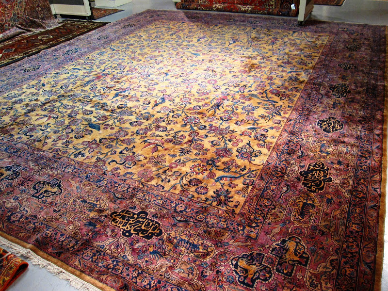 Manchester Kashan carpet from Central Persia with birds and floral details