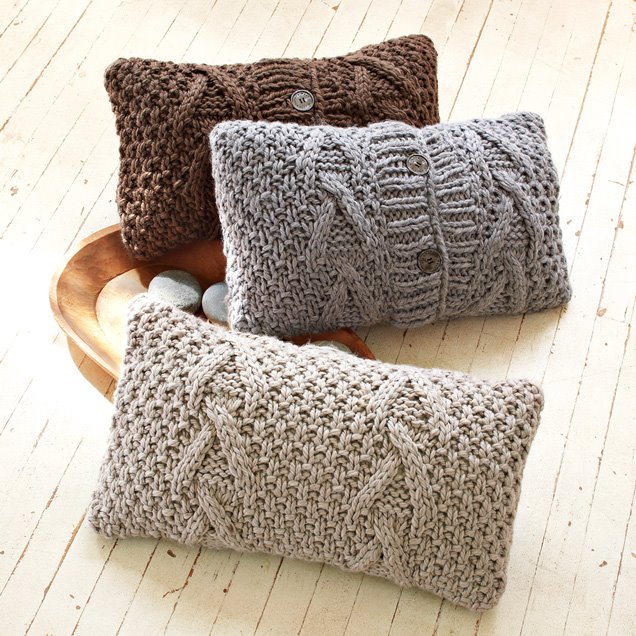 Three cable knit pillow cases by Tina Lutz and Marcia Patmos of Lutz & Patmos from West Elm