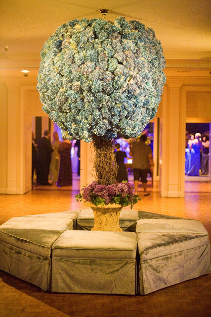 Hydrangea topiary for a summer wedding reception with velvet ottomans by event planner Delaney Todd Bagwell 