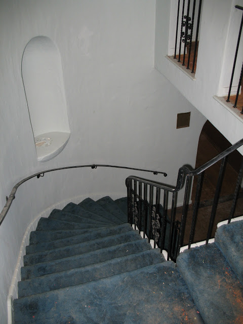Staircase to upstairs landing in a Hancock park home prior to renovation