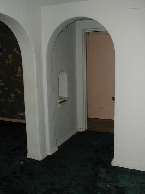 Arched doorway in a Hancock Park home prior to remodeling